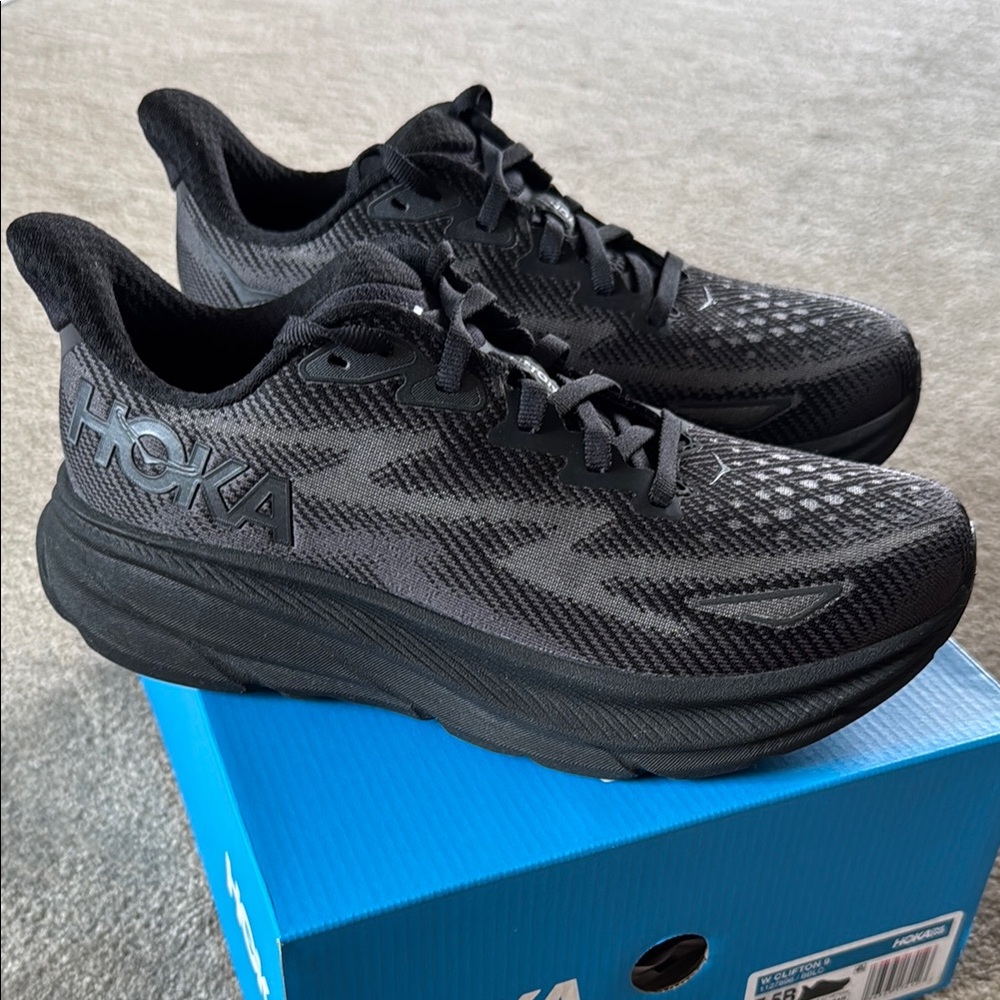 Hoka Black Athletic Shoes with Cushioned Midsole and Mesh Upper